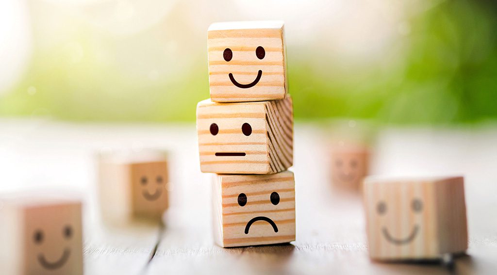 Customer experience ratings depicted by wood blocks