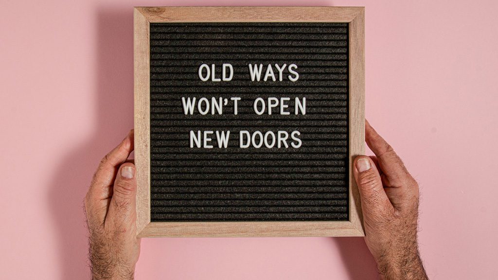 old ways won't open new doors sign